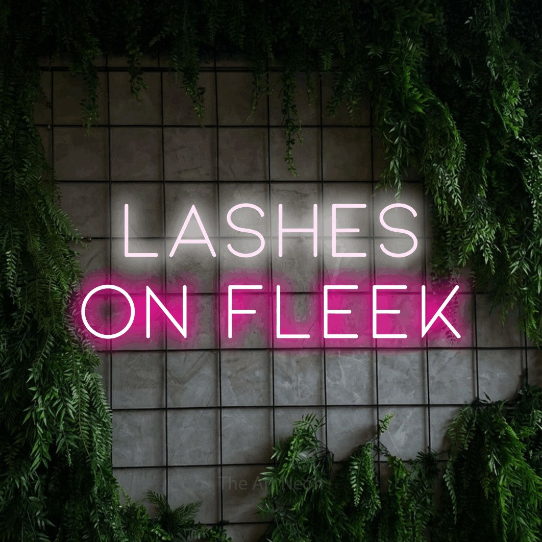 LED neon sign reading “Lashes on fleek”, arranged in 2 lines.