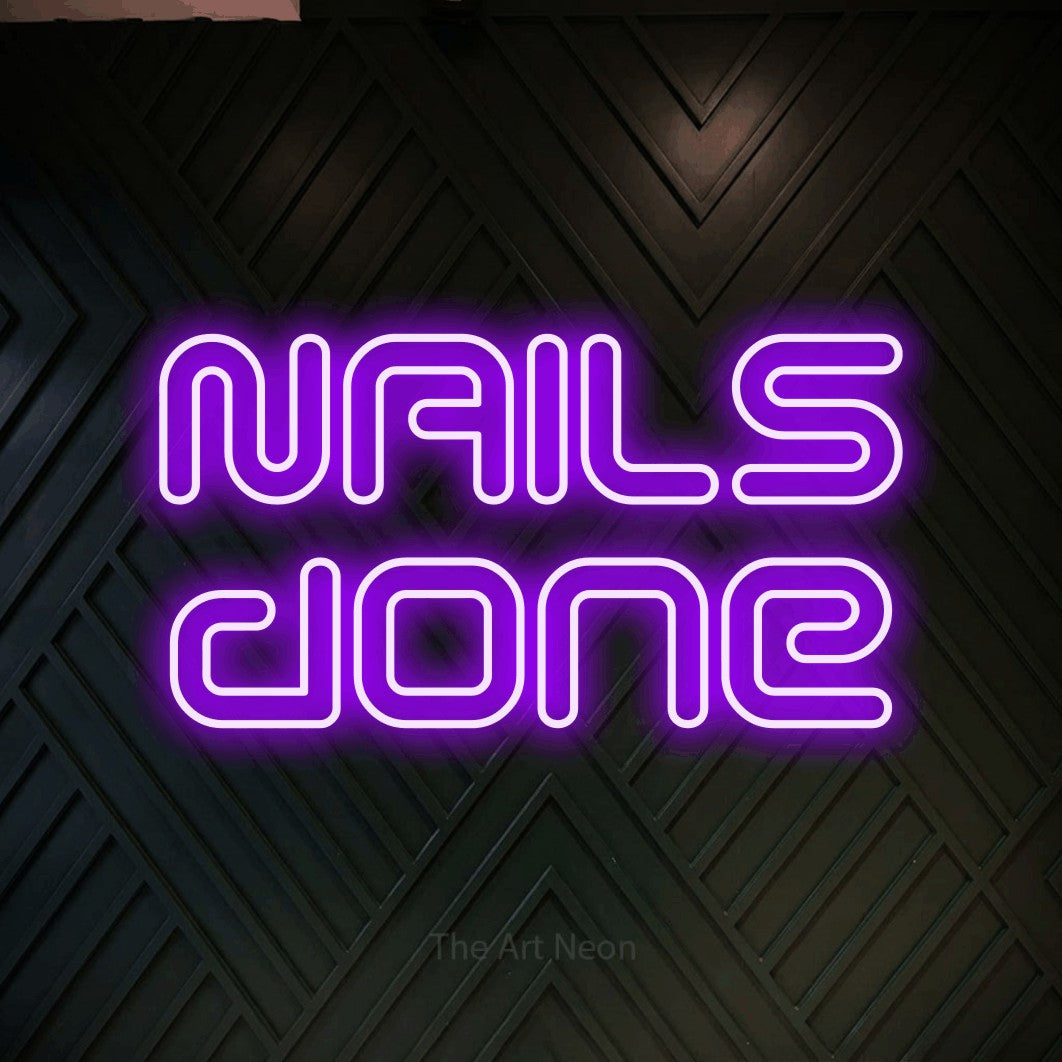 LED neon sign reading “NAILS done”, arranged in 2 lines.