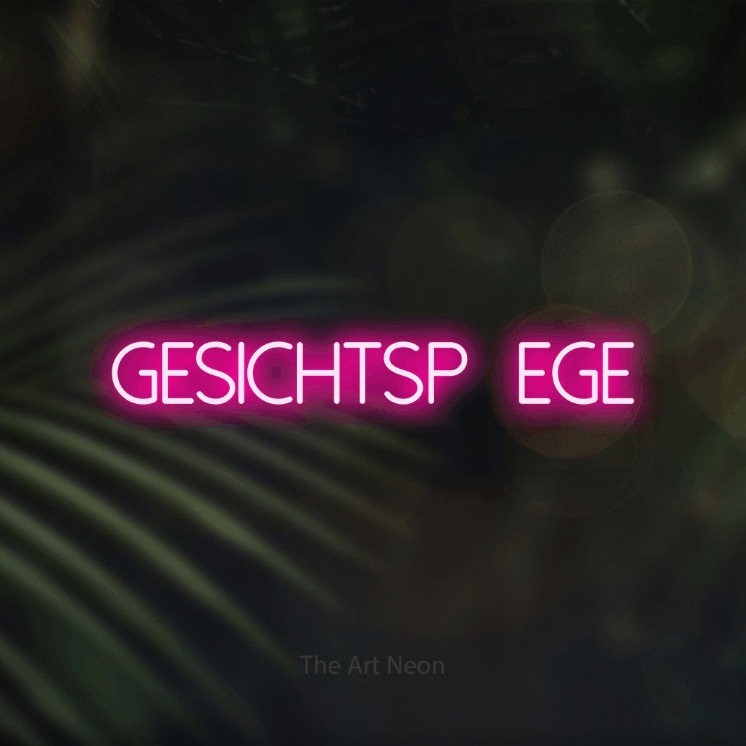 LED neon sign reading “gesichtspflege”, arranged in a single line.