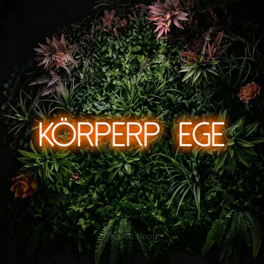 LED neon sign reading “körperpflege”, arranged in a single line.