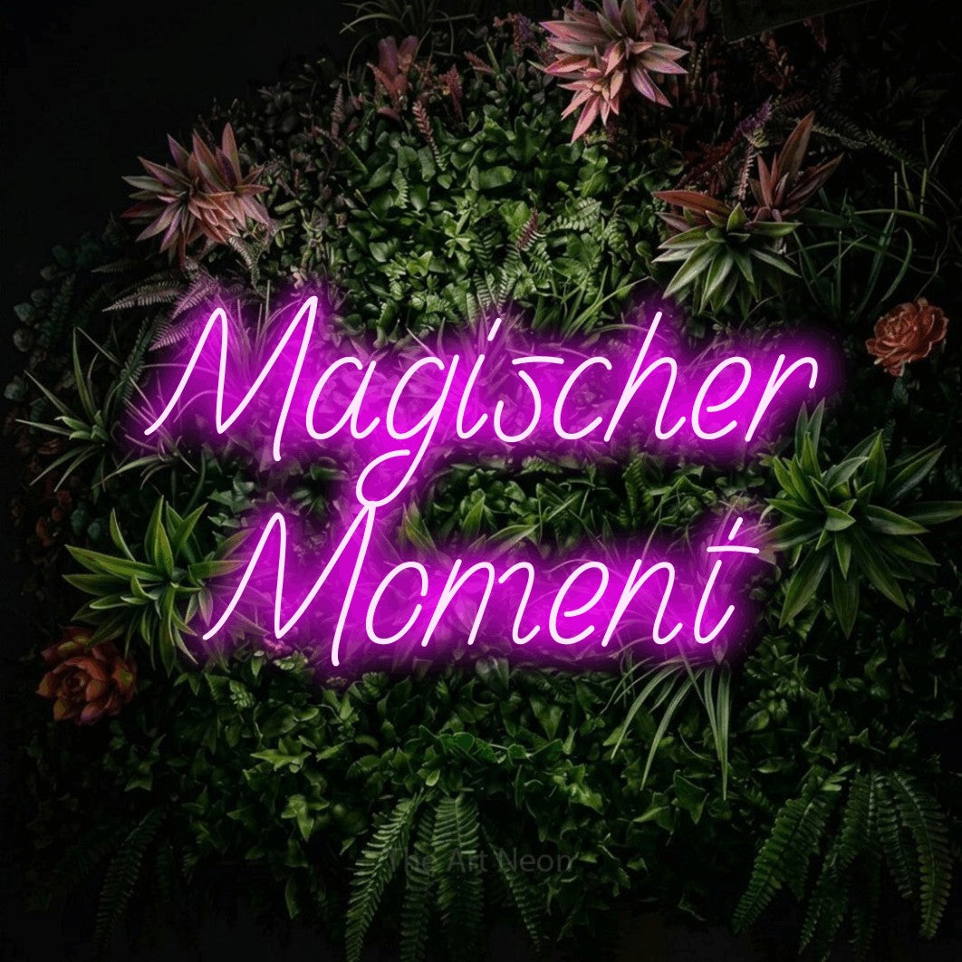 LED neon sign reading “Magischer Moment”, arranged in 2 lines.