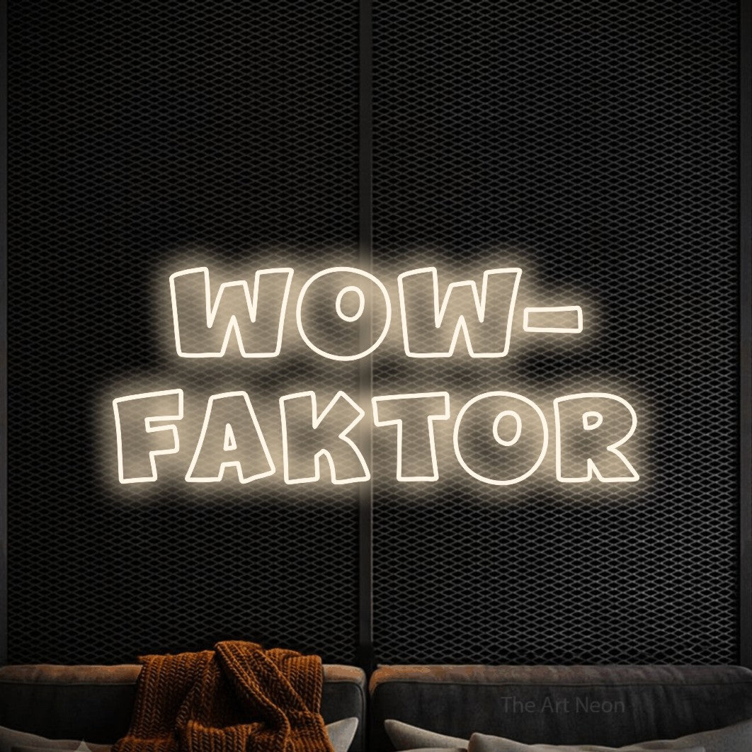 LED neon sign reading “Wow- Faktor”, arranged in 2 lines.