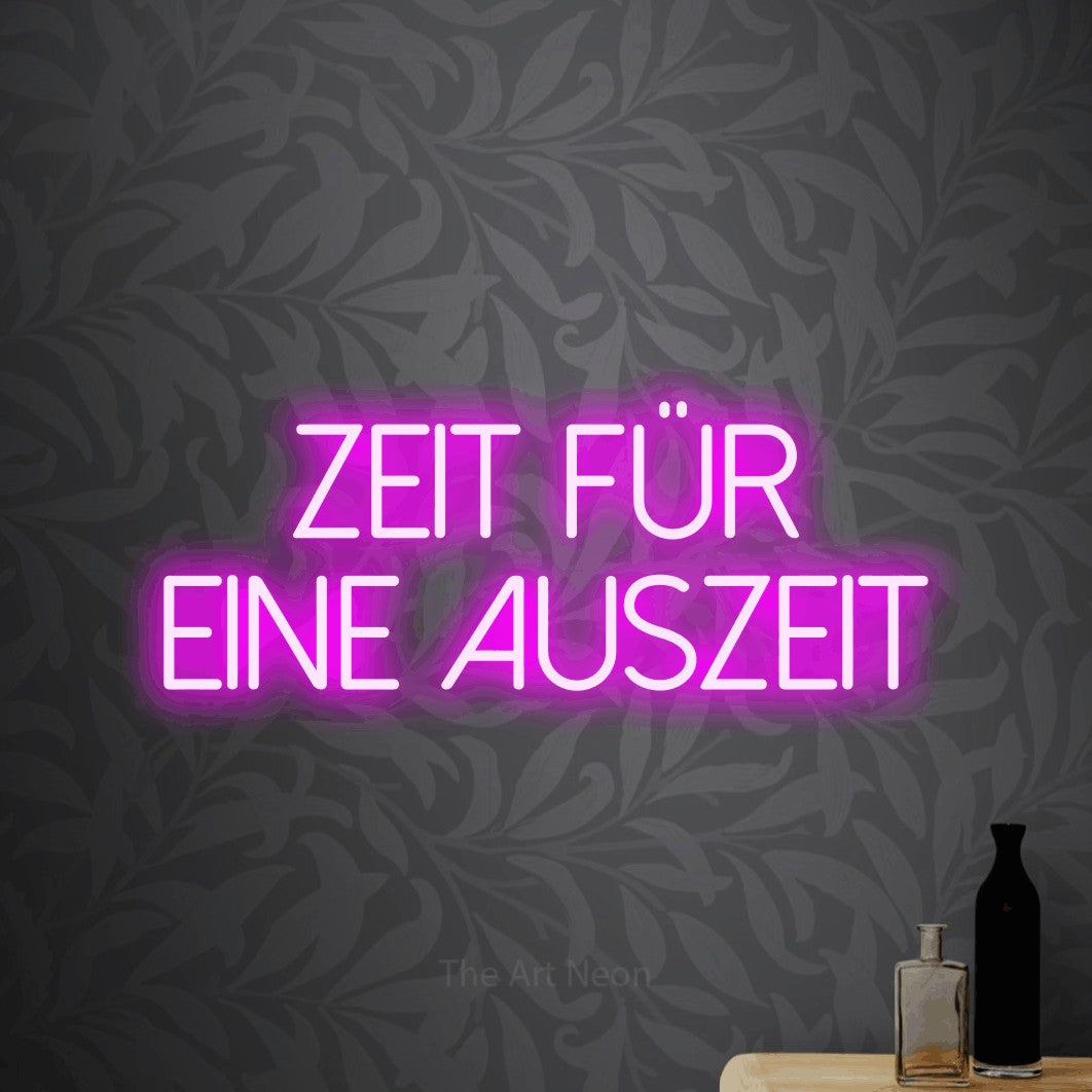 LED neon sign reading “Zeit für eine Auszeit”, arranged in 2 lines.