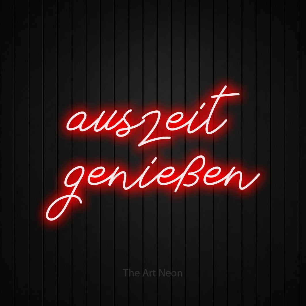 LED neon sign reading “auszeit genießen”, arranged in 2 lines.