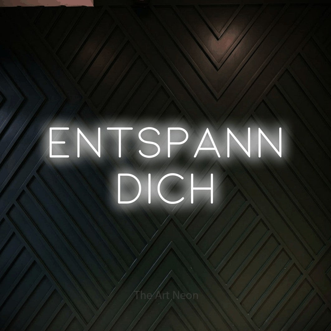 LED neon sign reading “ENTSPANN DICH”, arranged in 2 lines.