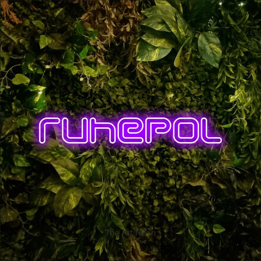 LED neon sign reading “ruhepol”, arranged in a single line.