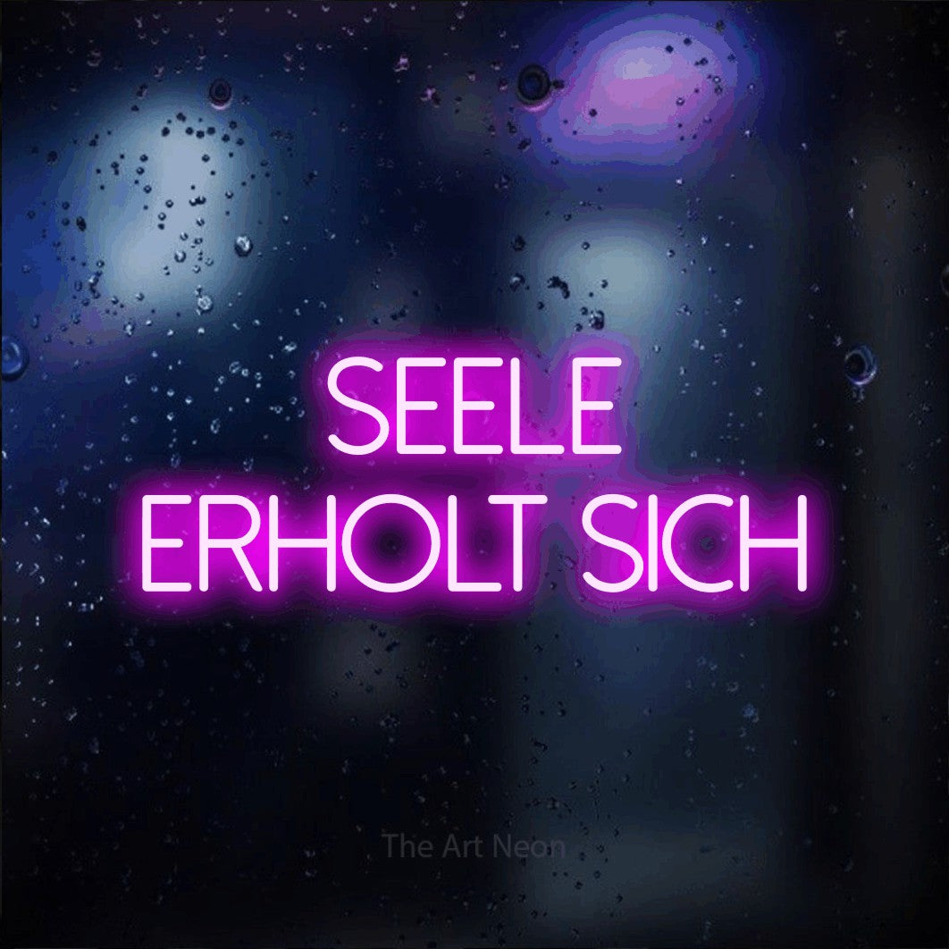 LED neon sign reading “Seele erholt sich”, arranged in 2 lines.