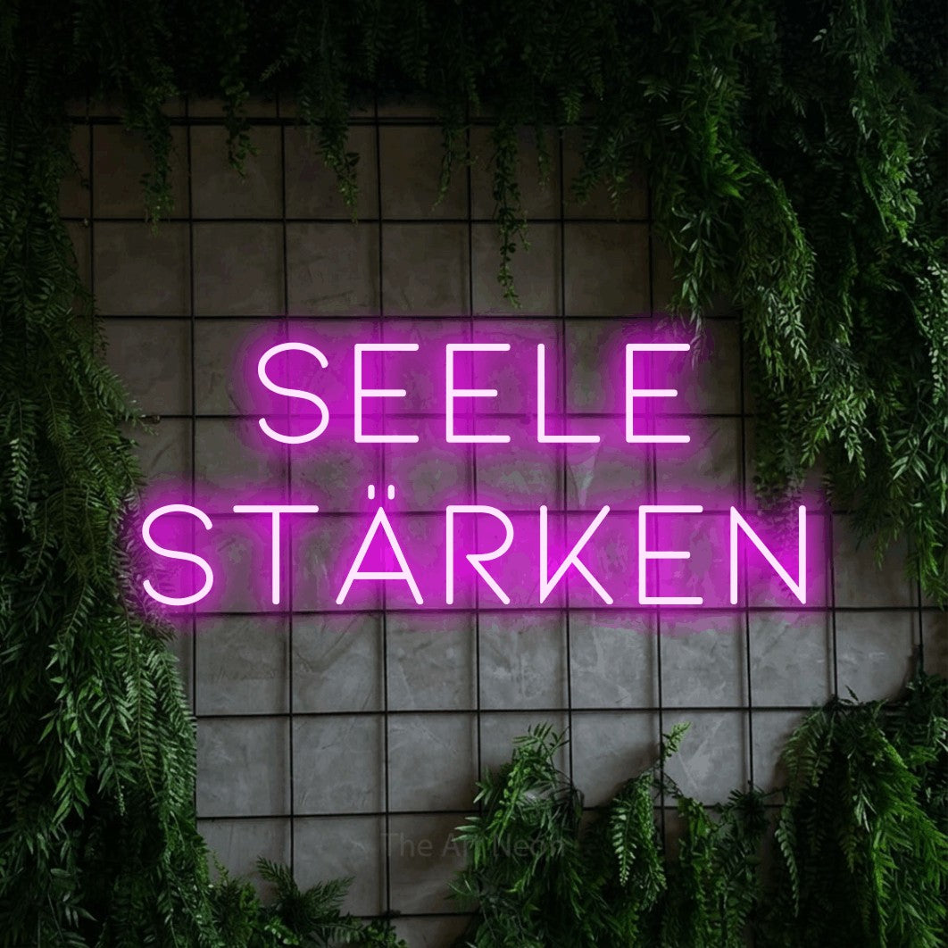 LED neon sign reading “Seele stärken”, arranged in 2 lines.