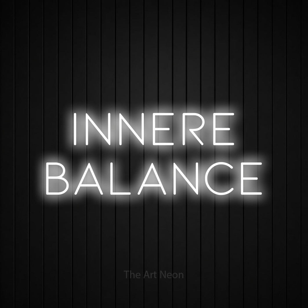LED neon sign reading “INNERE BALANCE”, arranged in 2 lines.