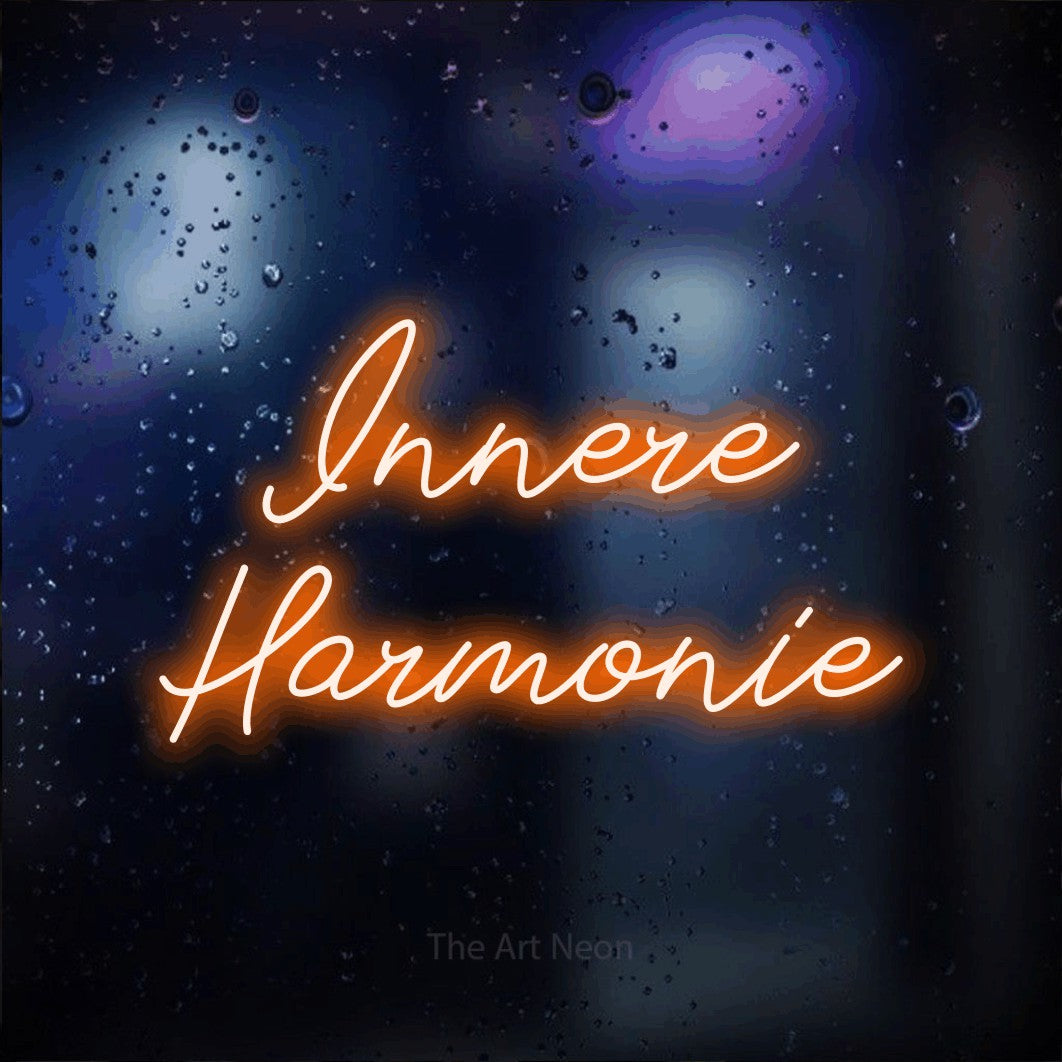 LED neon sign reading “Innere Harmonie”, arranged in 2 lines.