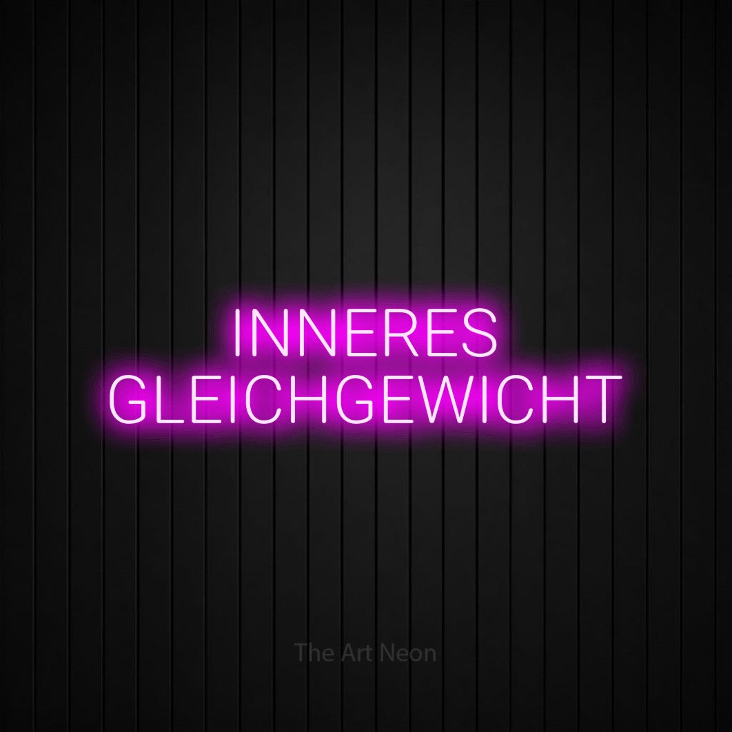 LED neon sign reading “INNERES GLEICHGEWICHT”, arranged in 2 lines.