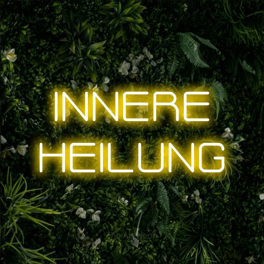 LED neon sign reading “INNERE HEILUNG”, arranged in 2 lines.