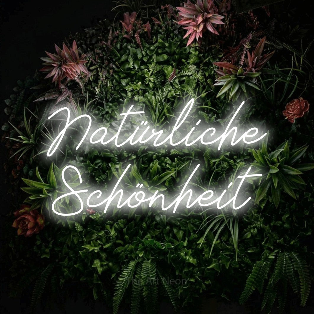 LED neon sign reading “Natürliche Schönheit”, arranged in 2 lines.