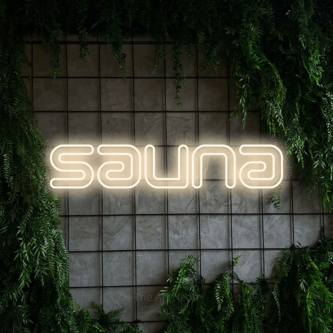LED neon sign reading “Sauna”, arranged in a single line.