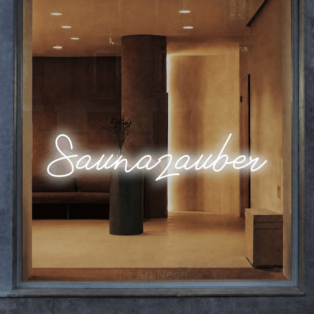 LED neon sign reading “Saunazauber”, arranged in a single line.