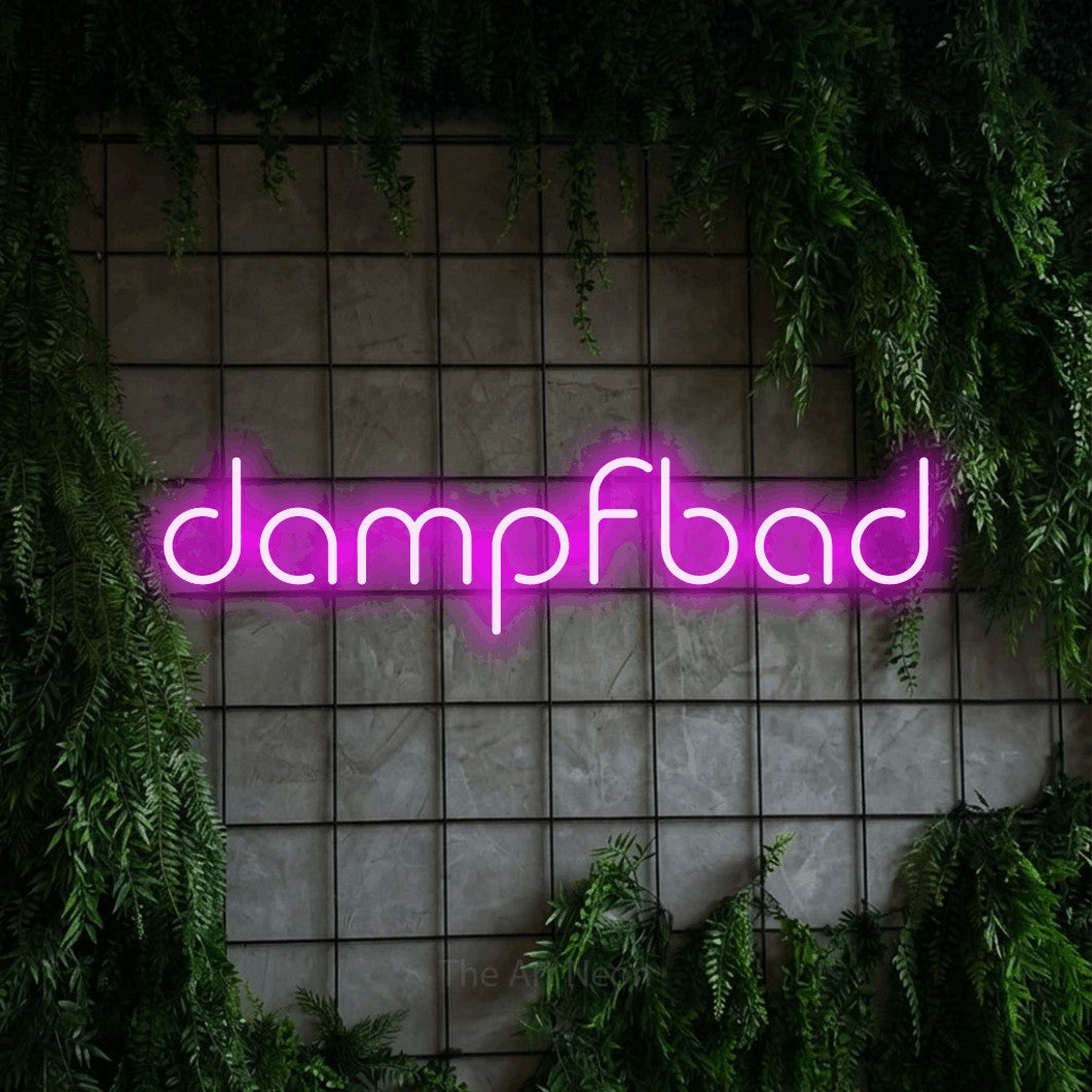 LED neon sign reading “dampfbad”, arranged in a single line.