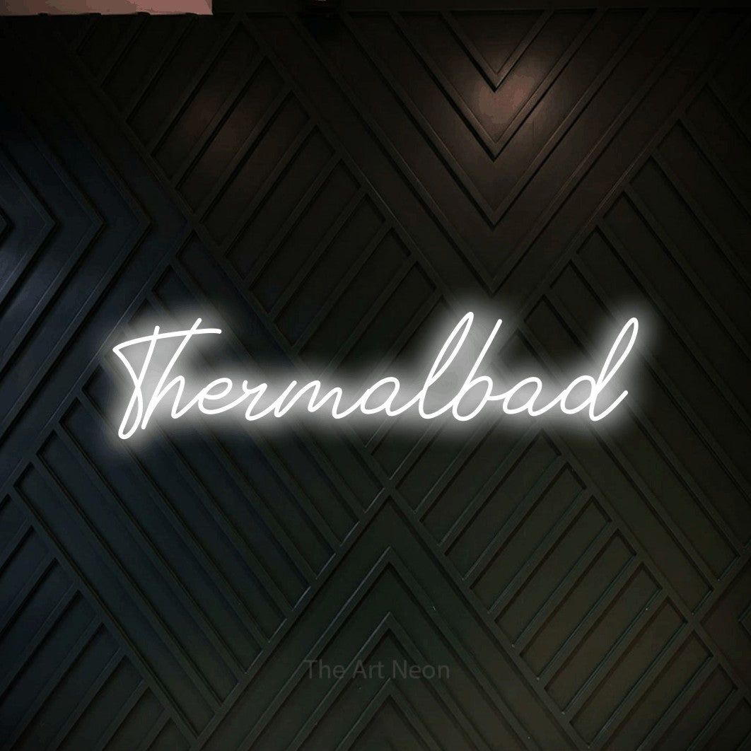 LED neon sign reading “Thermalbad”, arranged in a single line.
