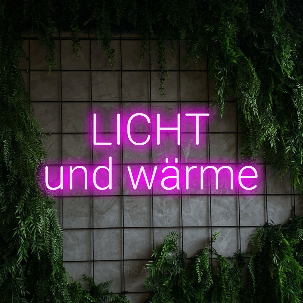 LED neon sign reading “LICHT und wärme”, arranged in 2 lines.