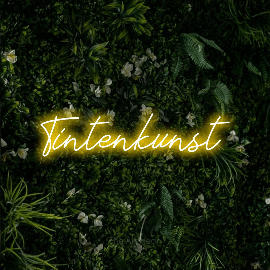 LED neon sign reading “Tintenkunst”, arranged in a single line.