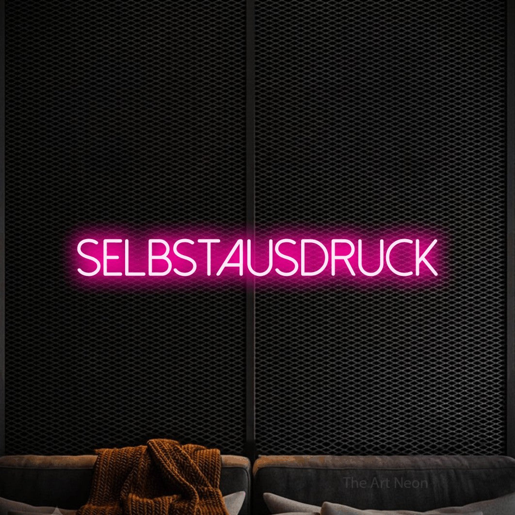 LED neon sign reading “SELBSTAUSDRUCK”, arranged in a single line.