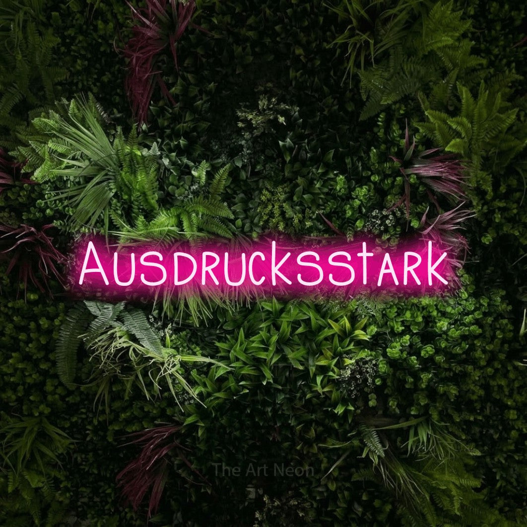 LED neon sign reading “Ausdrucksstark”, arranged in a single line.