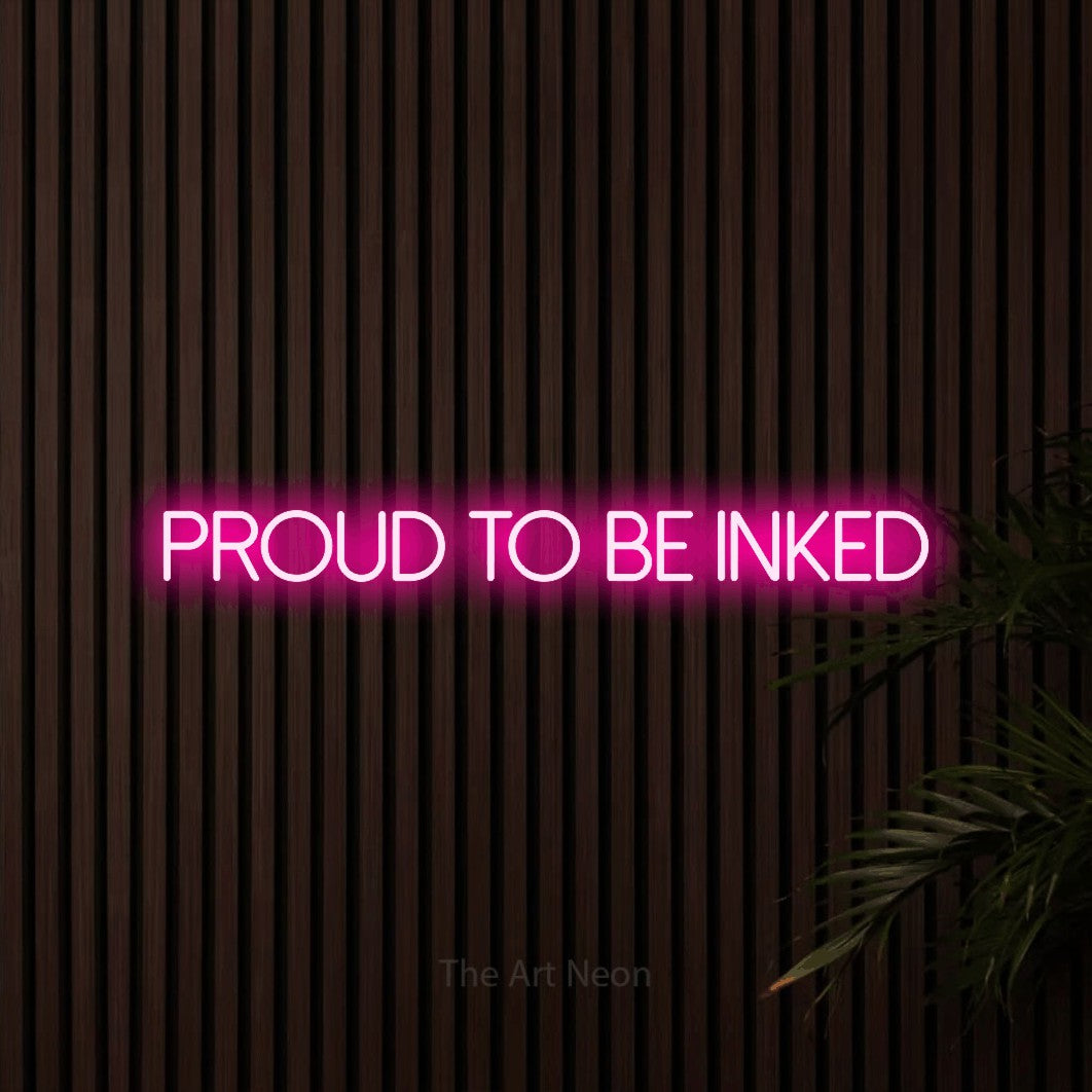 LED neon sign reading “PROUD TO BE INKED”, arranged in a single line.