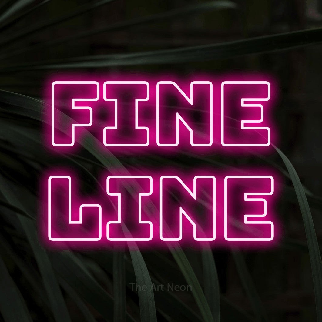 LED neon sign reading “Fine line”, arranged in 2 lines.