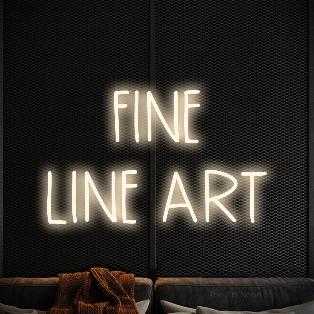 LED neon sign reading “FINE LINE ART”, arranged in 2 lines.