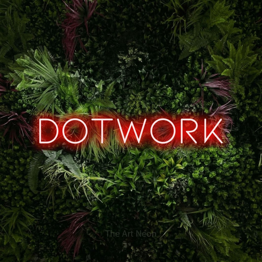 LED neon sign reading “dotwork”, arranged in a single line.