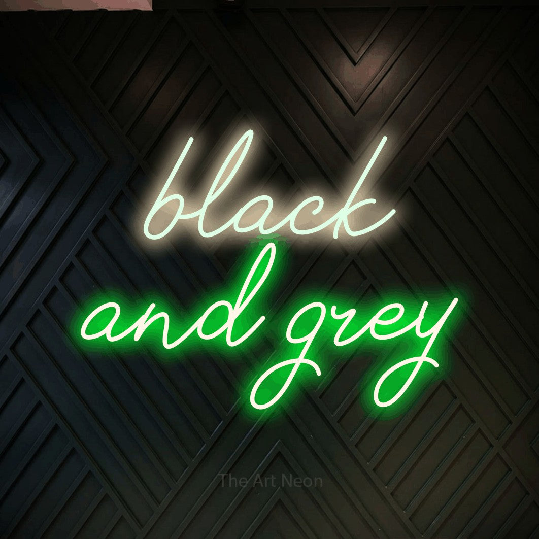 LED neon sign reading “black and grey”, arranged in 2 lines.