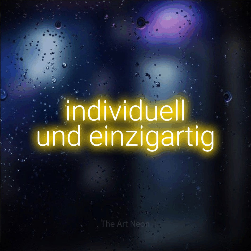 LED neon sign reading “individuell und einzigartig”, arranged in 2 lines.