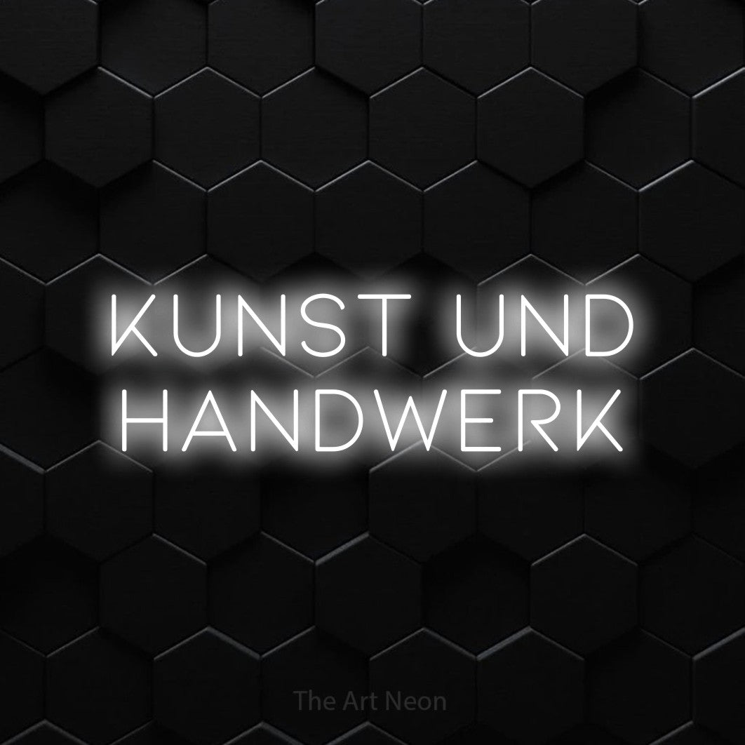 LED neon sign reading “KUNST UND HANDWERK”, arranged in 2 lines.