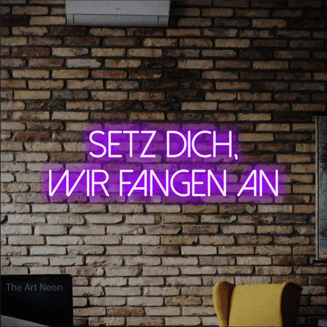 LED neon sign reading “Setz dich, wir fangen an”, arranged in 2 lines.