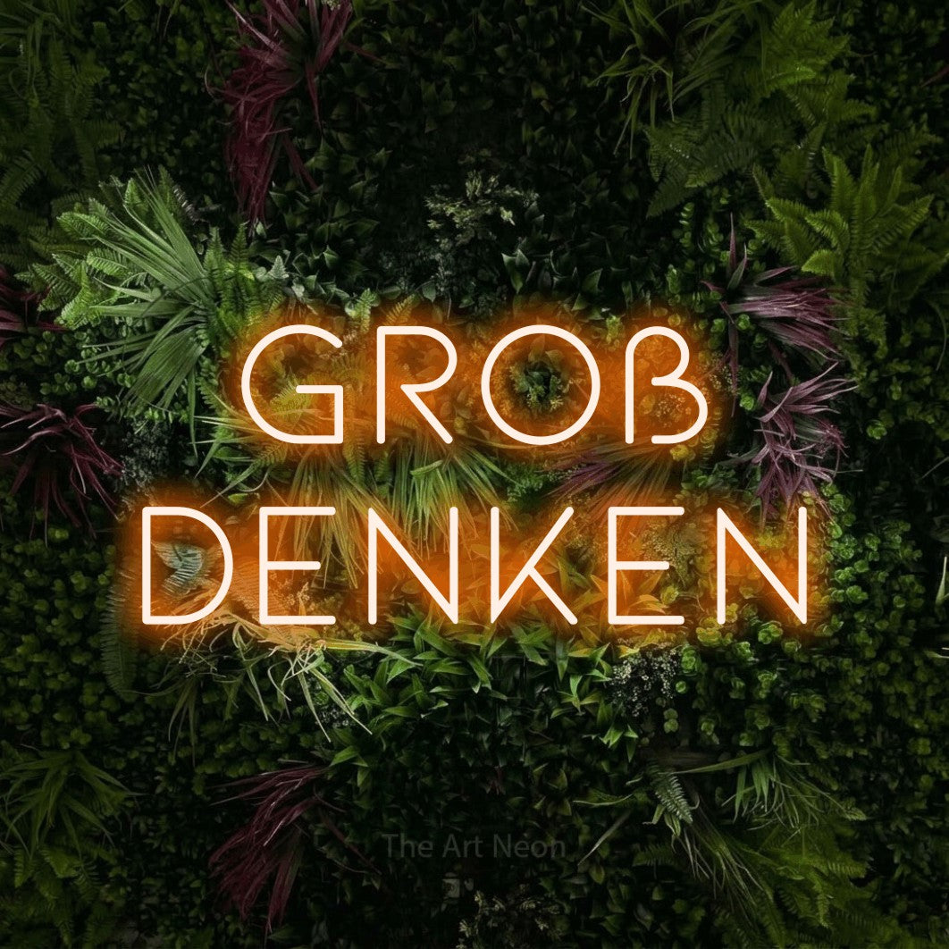 LED neon sign reading “groß denken”, arranged in 2 lines.