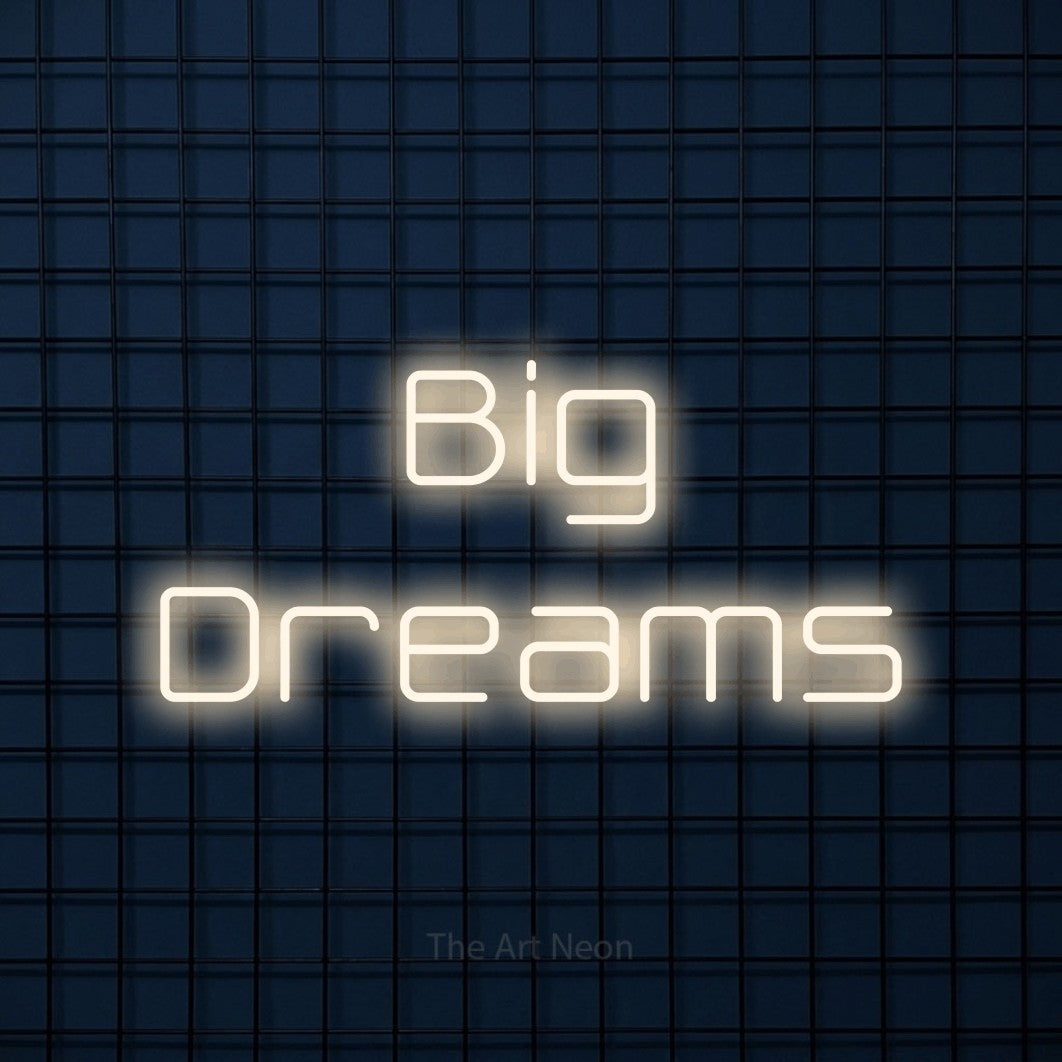 LED neon sign reading “Big Dreams”, arranged in 2 lines.