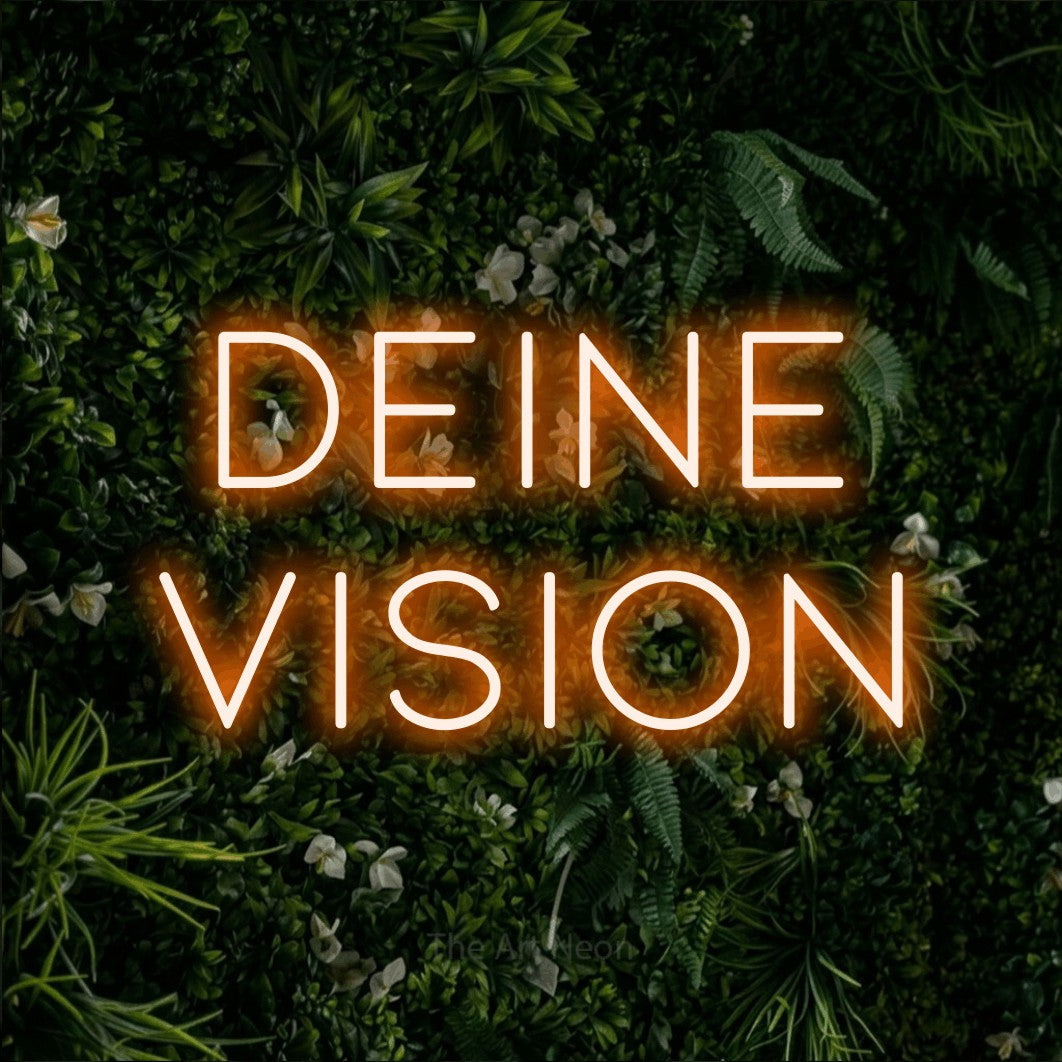 LED neon sign reading “deine vision”, arranged in 2 lines.