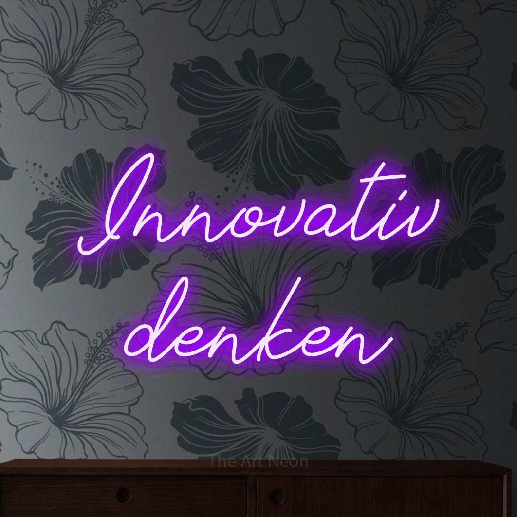 LED neon sign reading “Innovativ denken”, arranged in 2 lines.