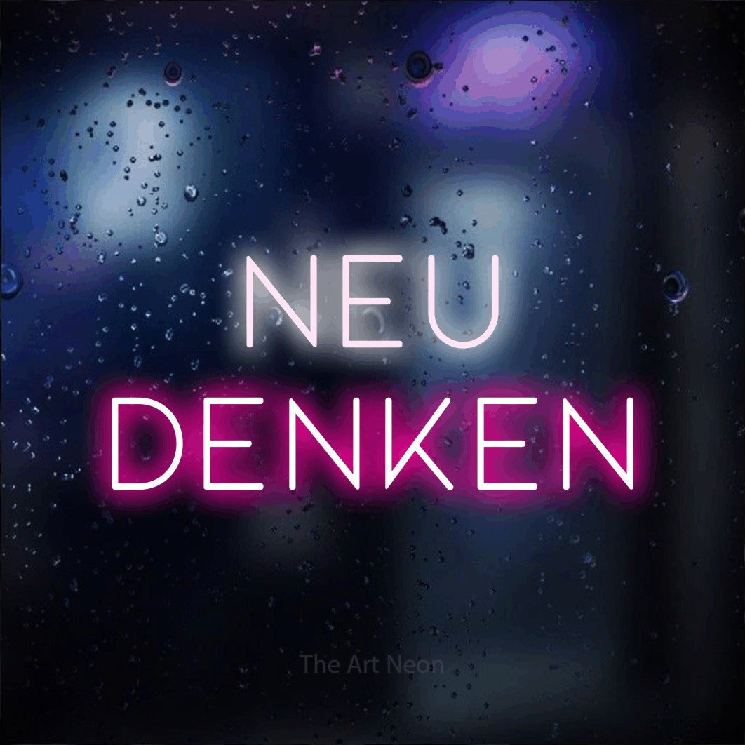 LED neon sign reading “neu denken”, arranged in 2 lines.