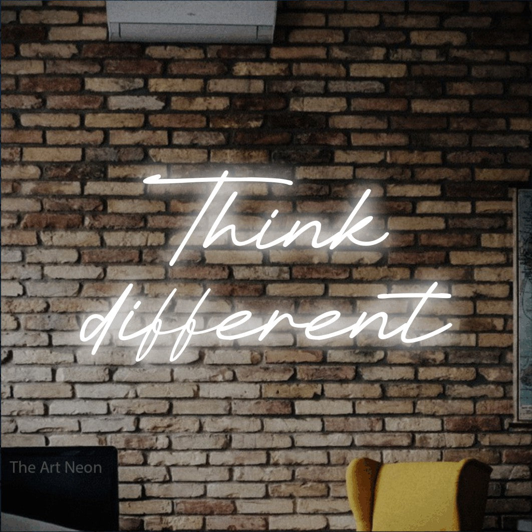 LED neon sign reading “Think different”, arranged in 2 lines.