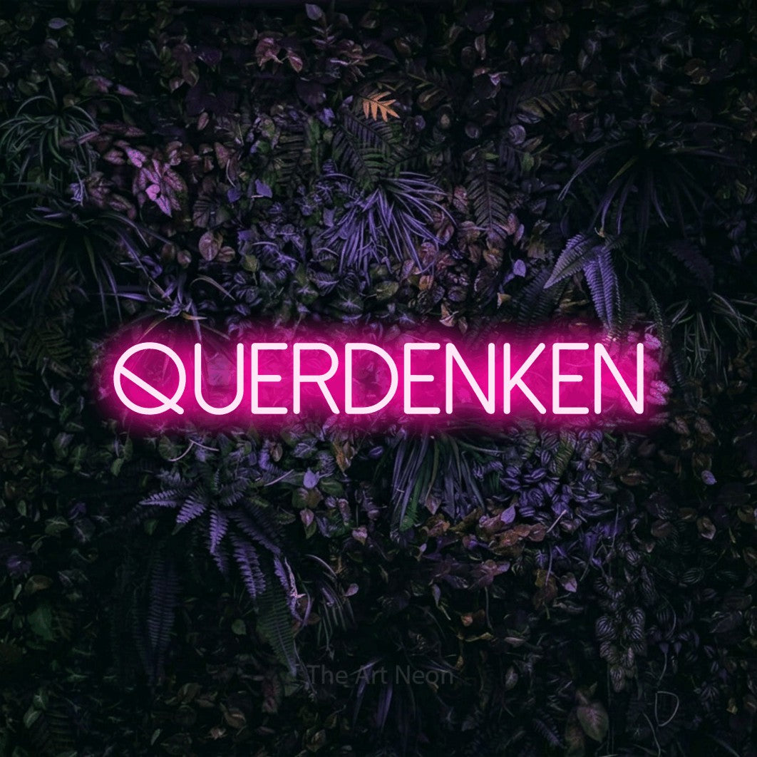 LED neon sign reading “querdenken”, arranged in a single line.