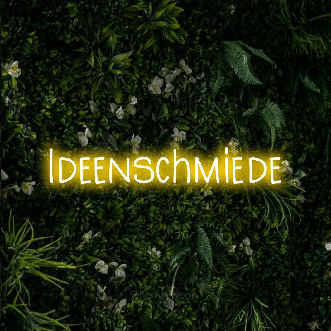LED neon sign reading “Ideenschmiede”, arranged in a single line.