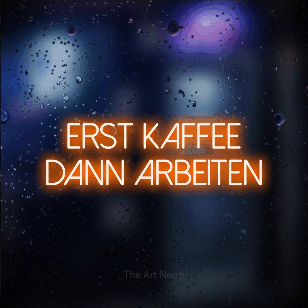 LED neon sign reading “erst kaffee dann arbeiten”, arranged in 2 lines.