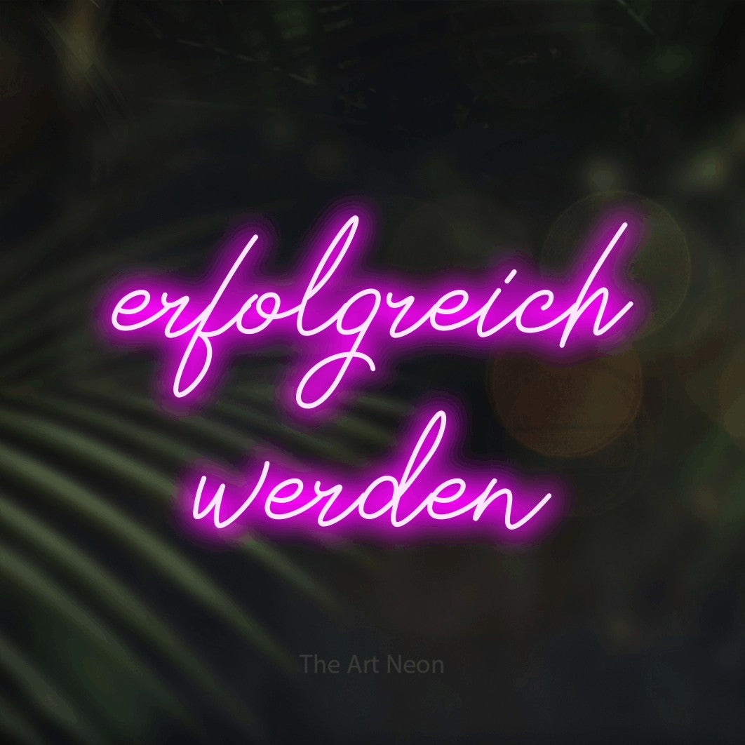 LED neon sign reading “erfolgreich werden”, arranged in 2 lines.