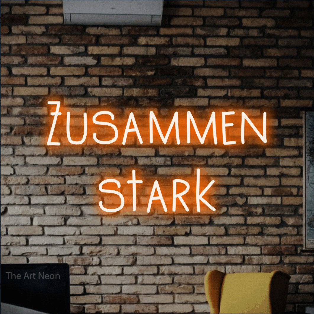 LED neon sign reading “Zusammen stark”, arranged in 2 lines.