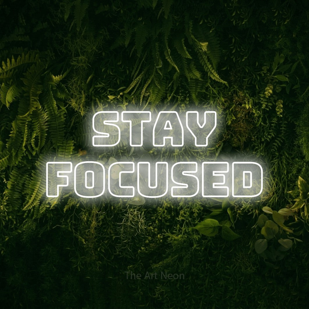 LED neon sign reading “STAY FOCUSED”, arranged in 2 lines.