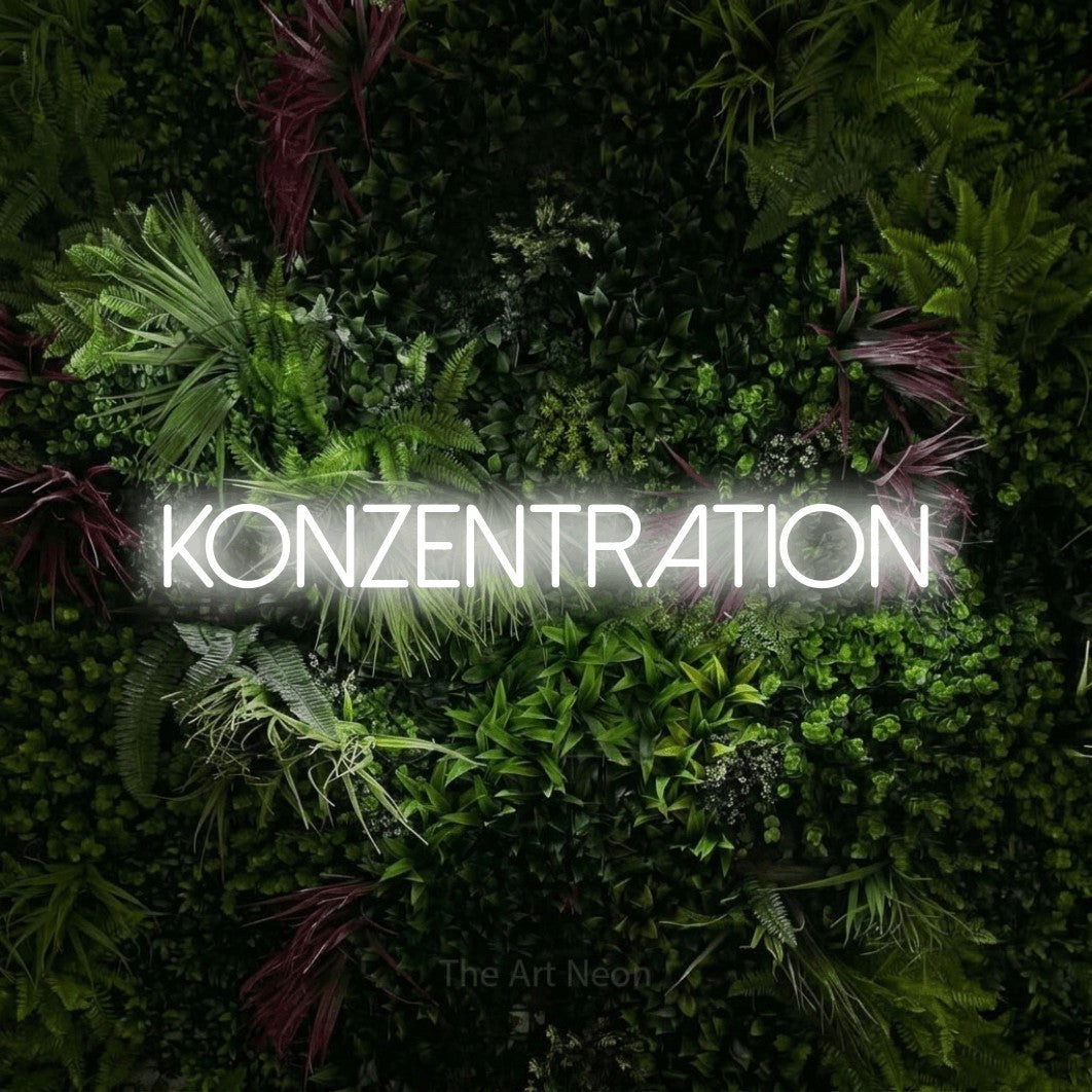 LED neon sign reading “Konzentration”, arranged in a single line.