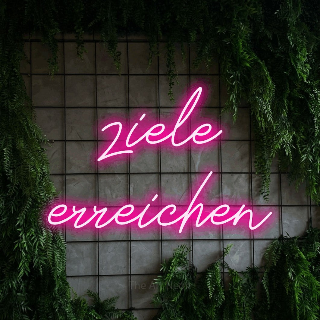 LED neon sign reading “ziele erreichen”, arranged in 2 lines.