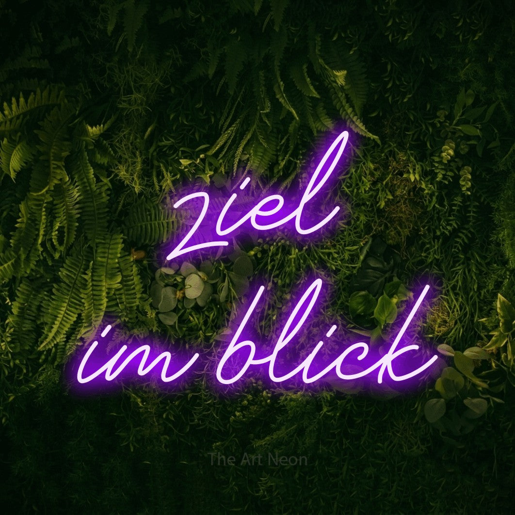 LED neon sign reading “ziel im blick”, arranged in 2 lines.