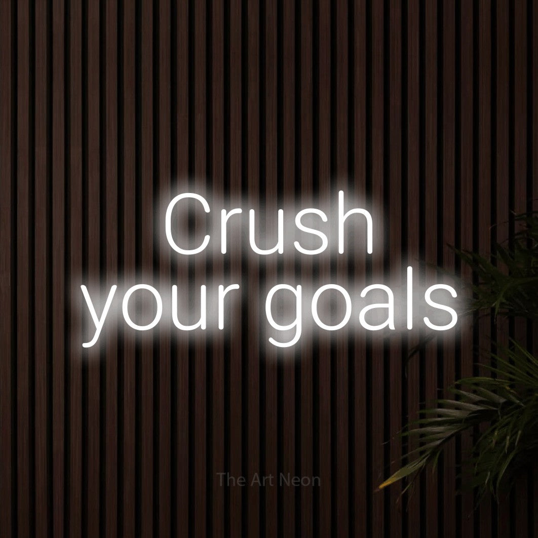 LED neon sign reading “Crush your goals”, arranged in 2 lines.