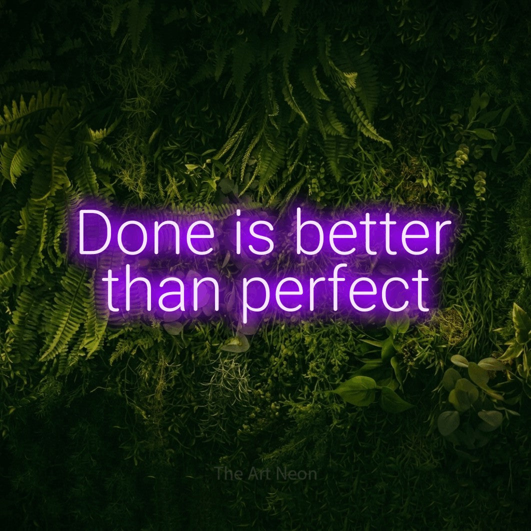 LED neon sign reading “Done is better than perfect”, arranged in 2 lines.